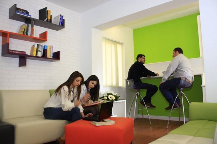 Members relaxing in the lounge and reading corner