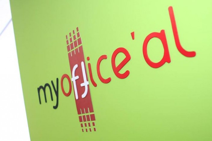 MyOffice'Al logo on the green wall of the space